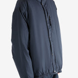 Navy jacket worn by a person, showing the jacket's fit