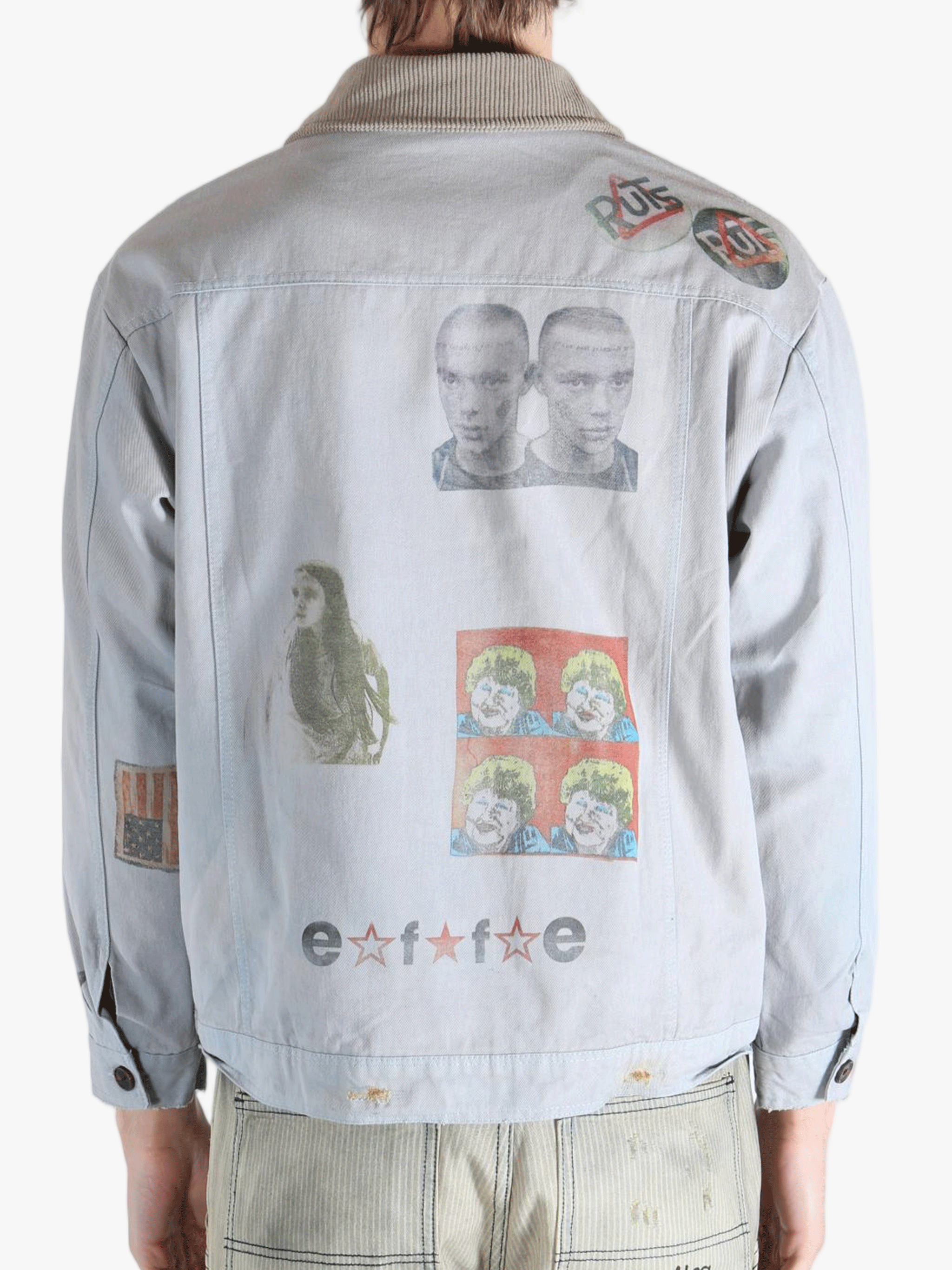 Grey jacket worn by a person, showing the jacket's fit
