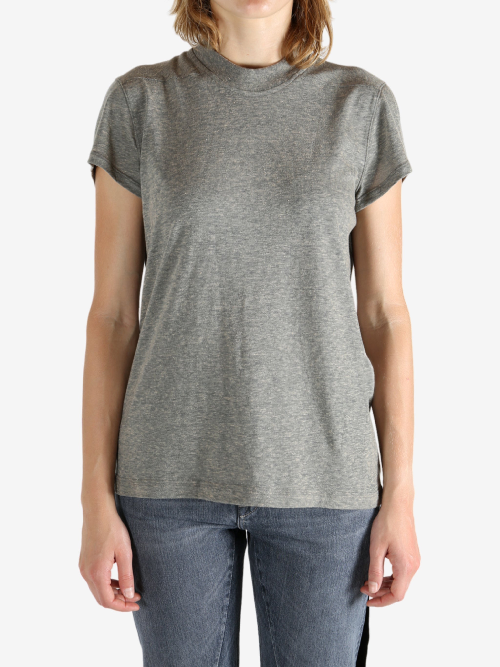 Grey t-shirt worn by a person, showing the shirt's fit