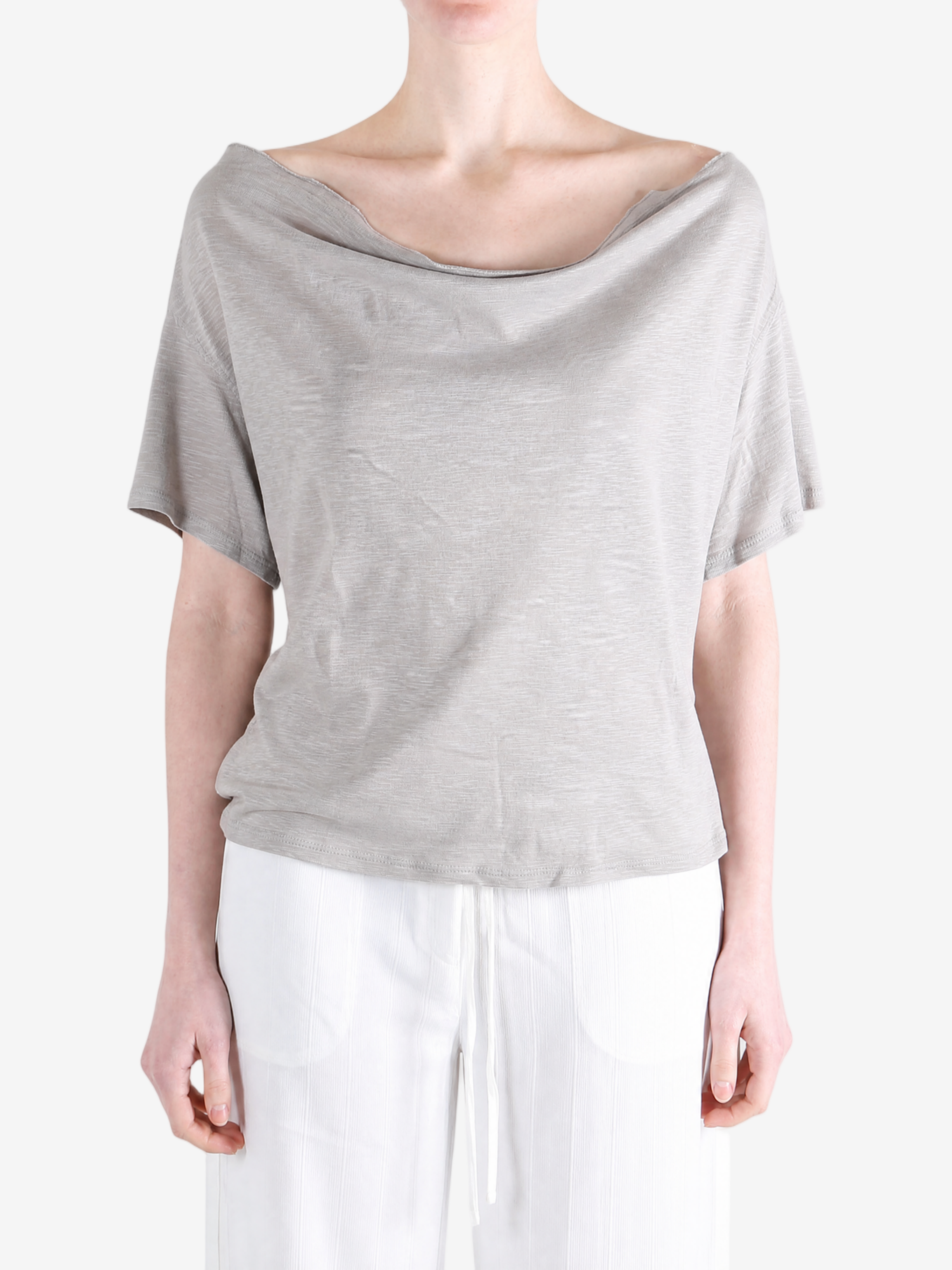 Grey knitwear worn by a person, showing the knitwear fit