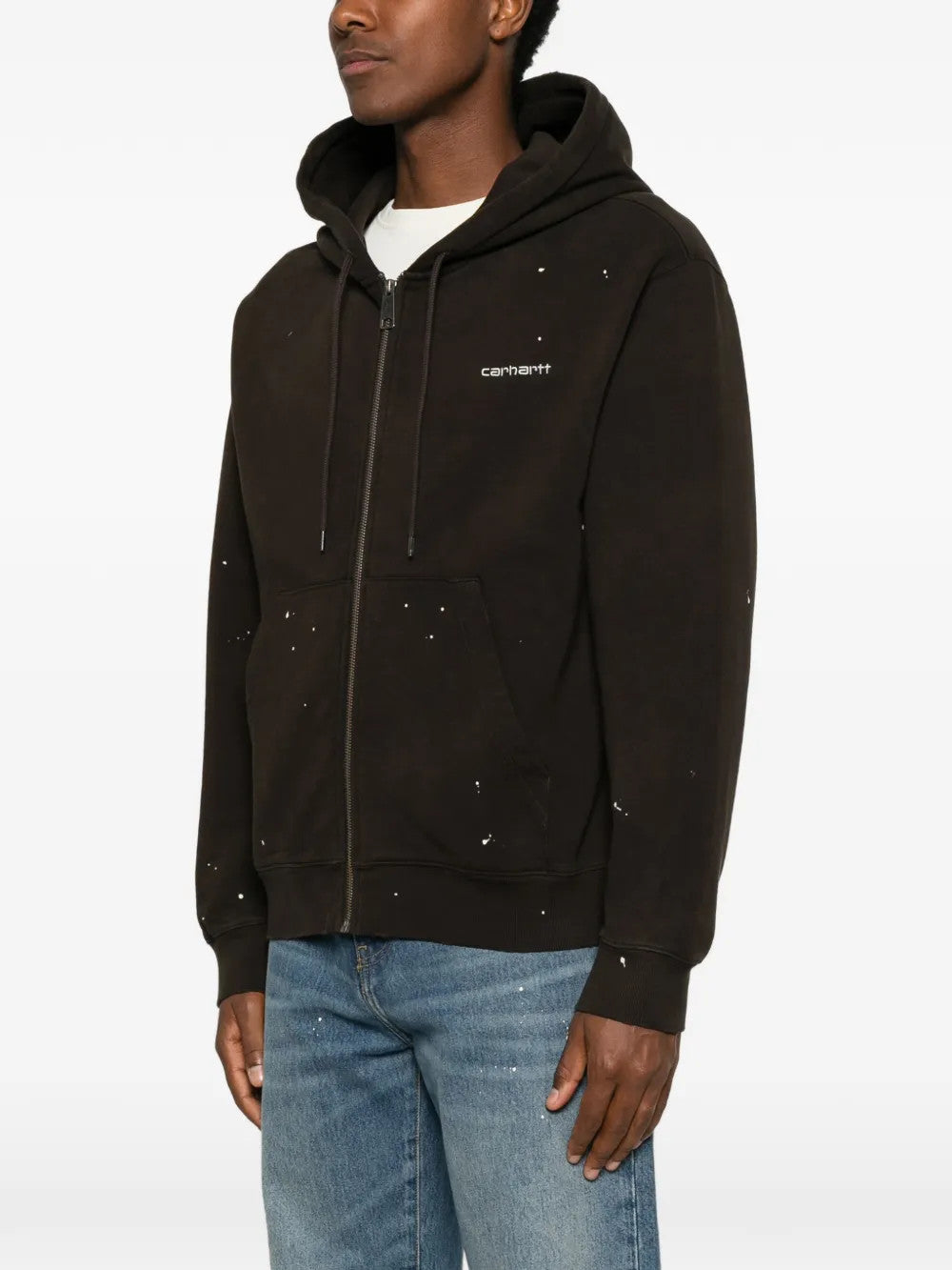 Black jacket worn by a person, showing the jacket fit