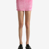 Pink skirt worn by a person, showing the skirt's fit