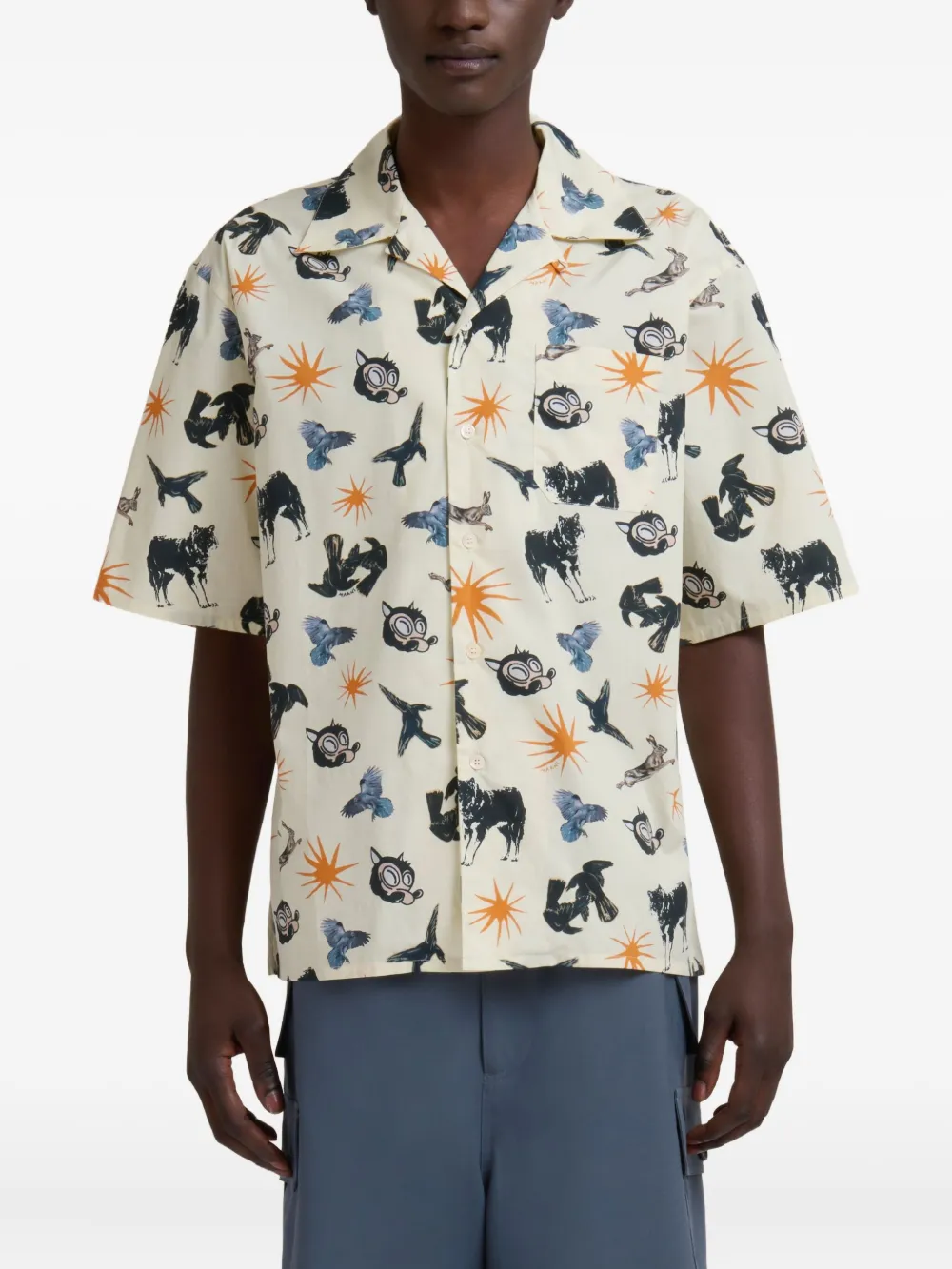 Tan shirts worn by a person, showing the shirts fit