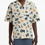 Tan shirts worn by a person, showing the shirts fit