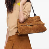 Brown bag worn by a person, showing the bag's fit