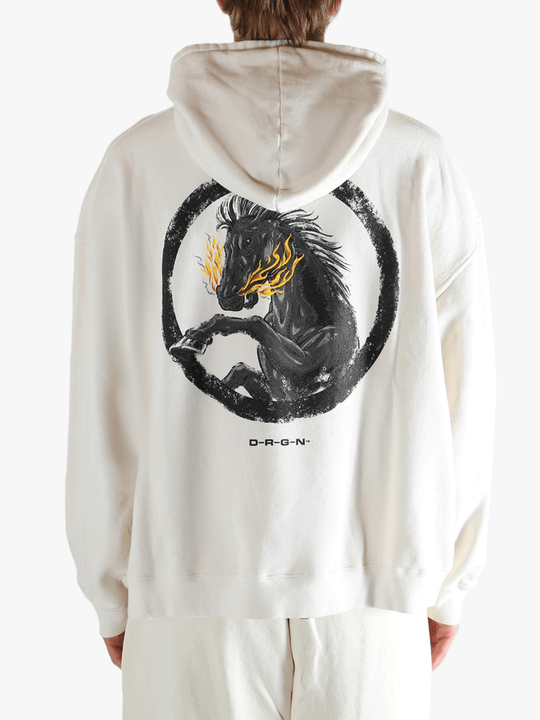 White hoodie worn by a person, showing the hoodie's fit