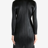 Black shirt worn by a person, showing the shirt's fit