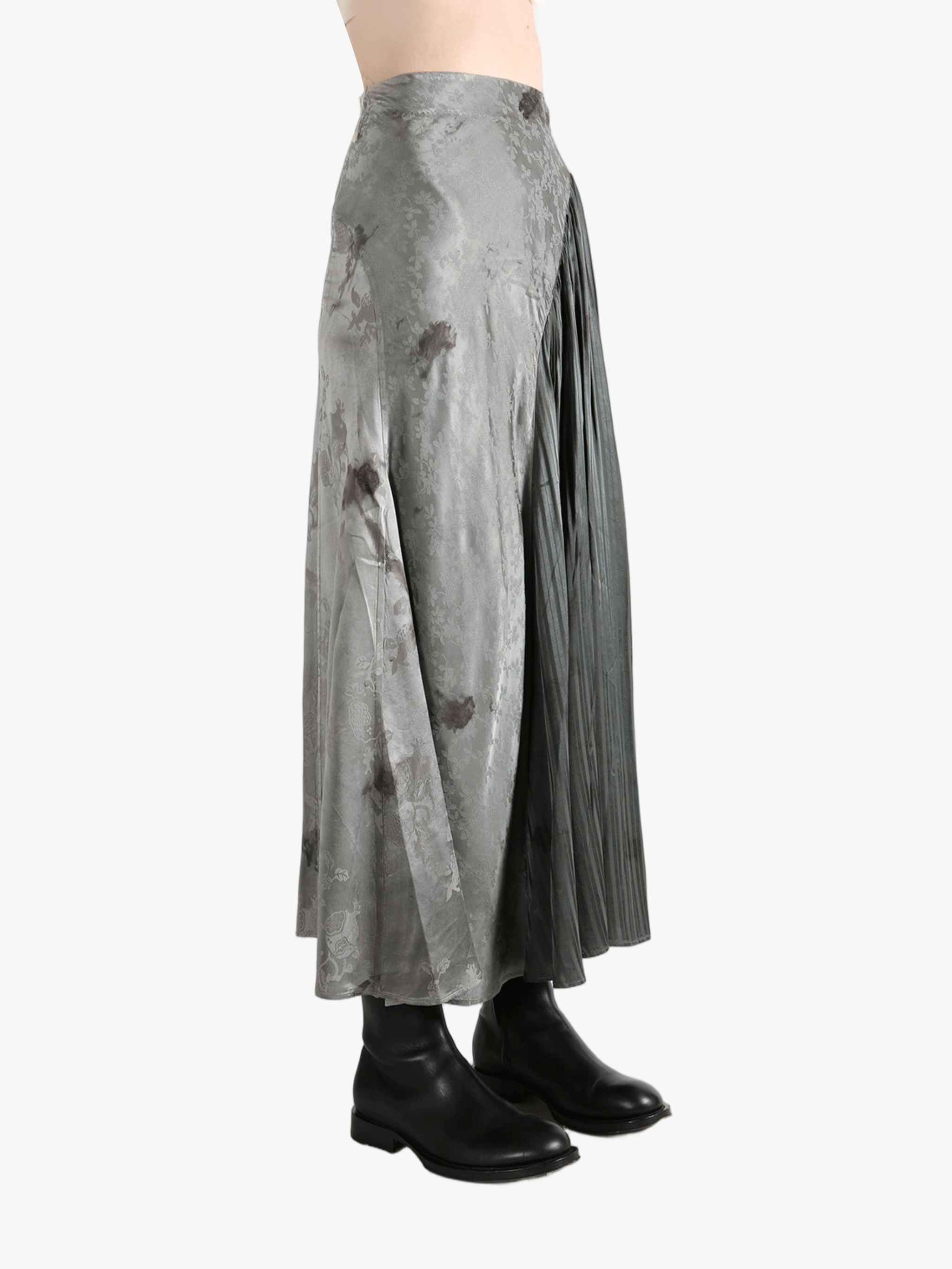 grey skirts worn by a person, showing the skirts  fit