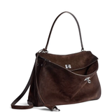Close up of brown bag, showing texture of the calf suede fabric