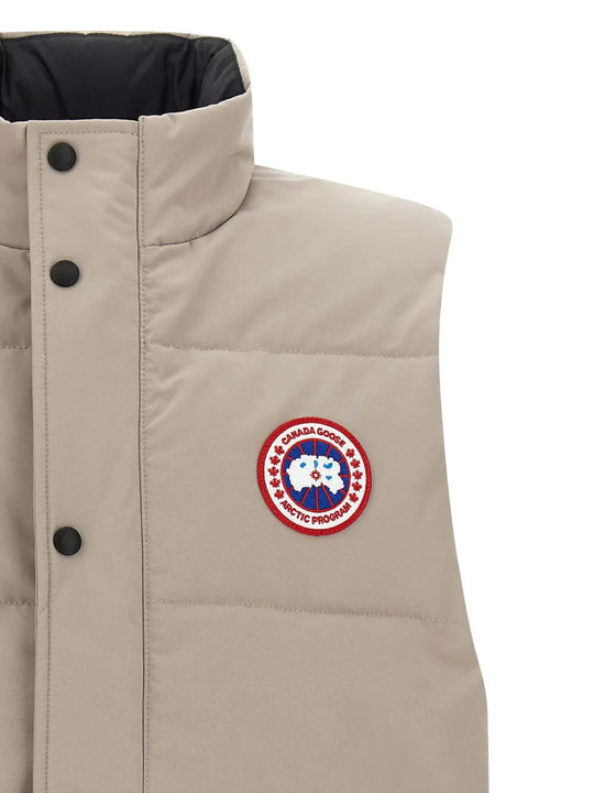 Close up of Tan jacket, showing texture of the 84% polyester/ 16% cotton fabric