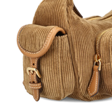 Close up of brown bag, showing texture of the cotton fabric