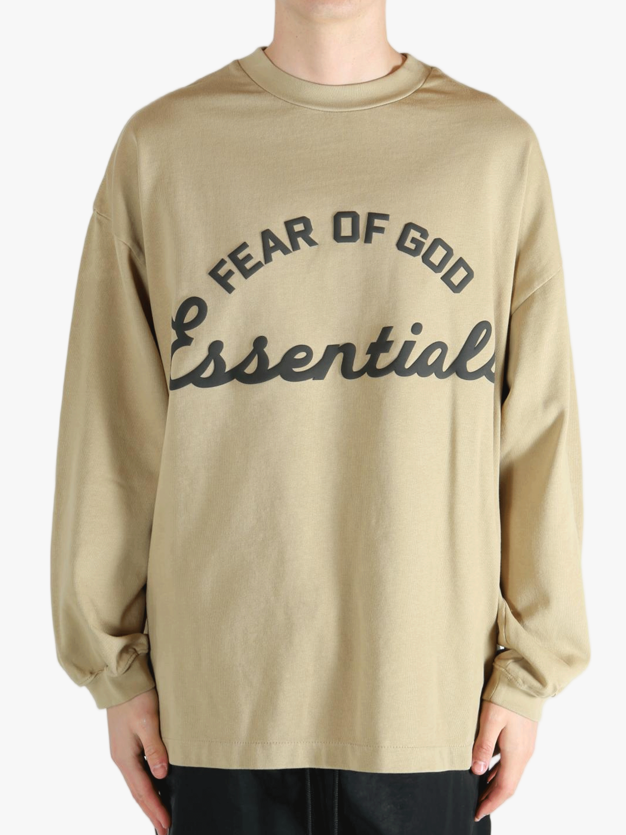 Tan t-shirt worn by a person, showing the t-shirt's fit