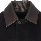 Close up of black jackets, showing texture of the cashmere fabric