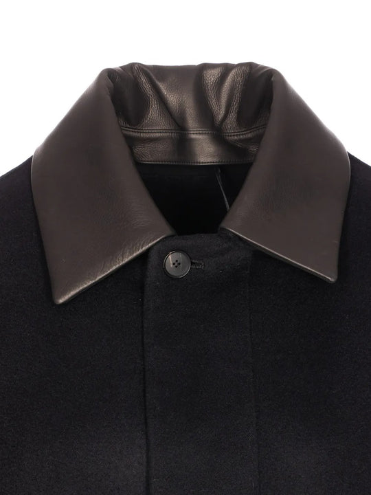 Close up of black jackets, showing texture of the cashmere fabric