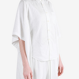 White top, full body view