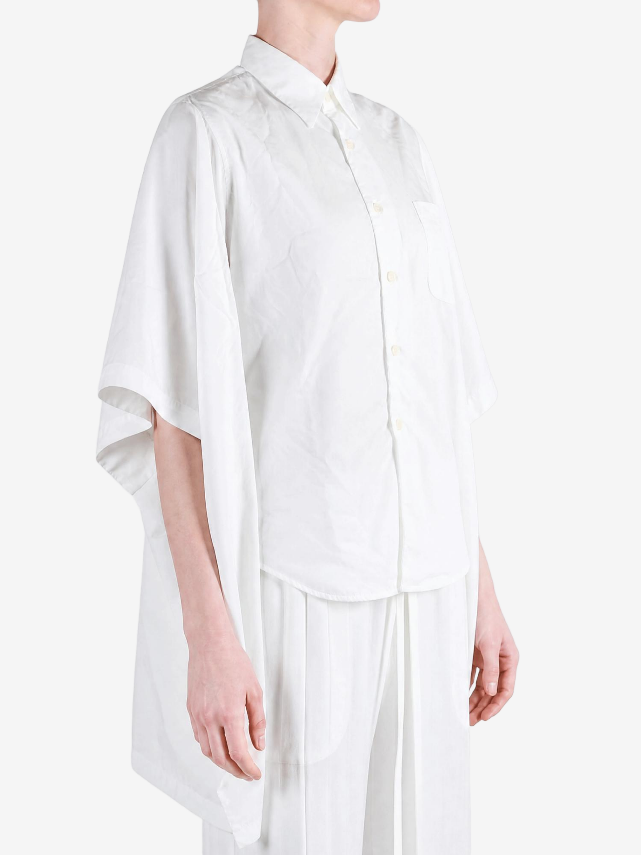White top, full body view