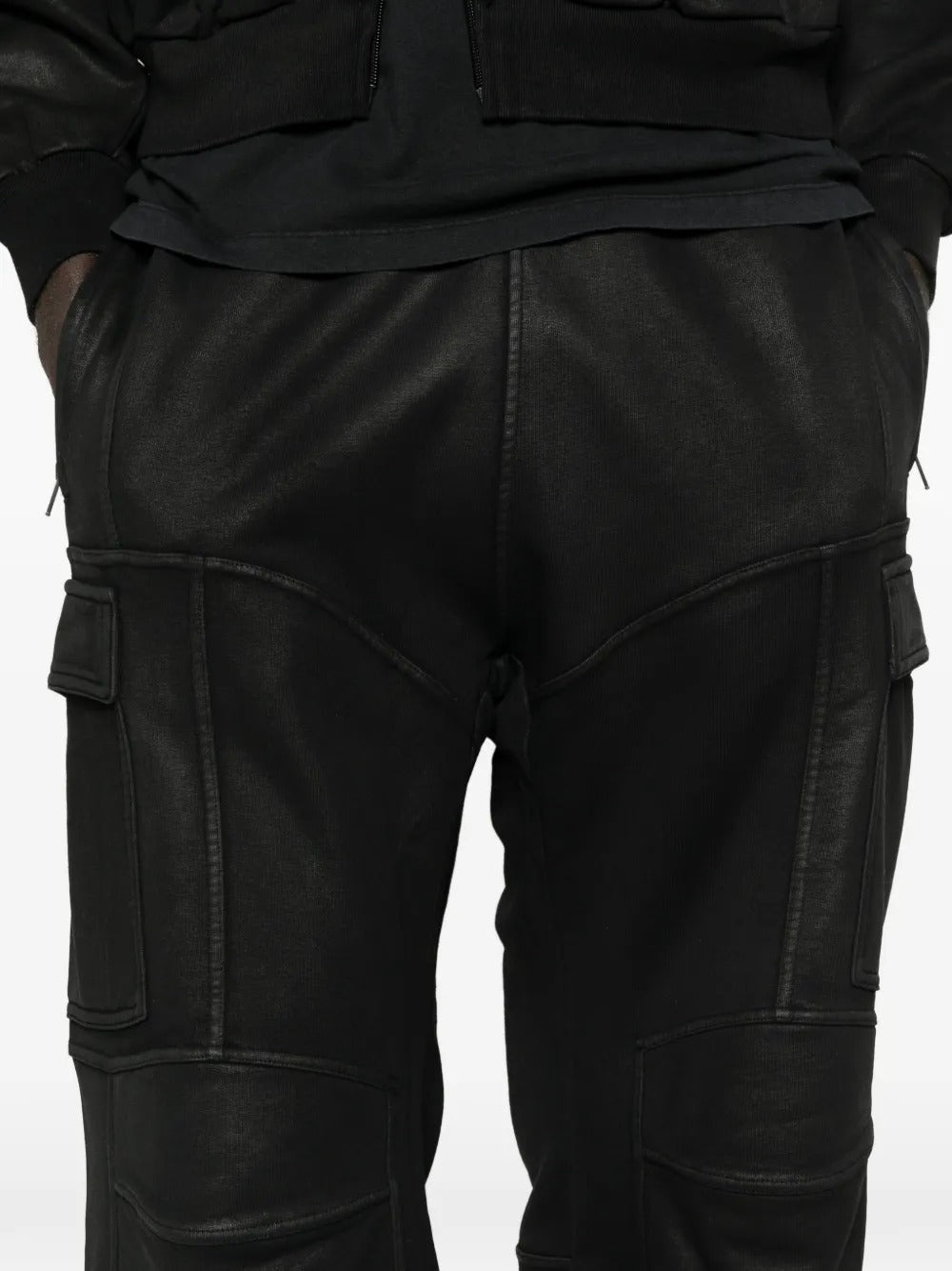 Close up of black pants, showing texture of the fabric