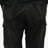 Close up of black pants, showing texture of the fabric