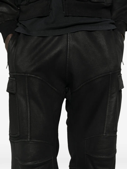 Close up of black pants, showing texture of the fabric