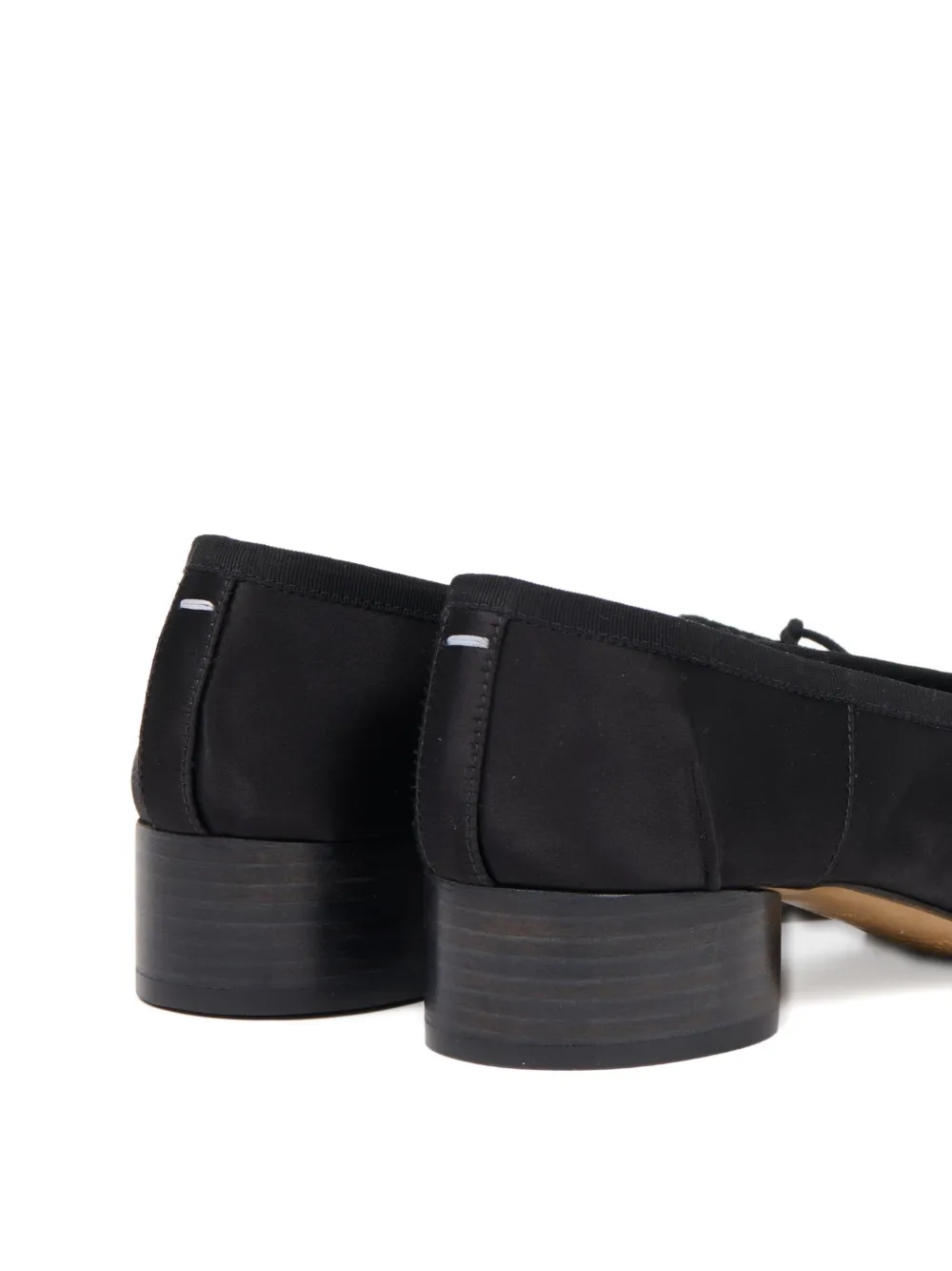 Close up of black shoe,showing texture of the cotton fabric