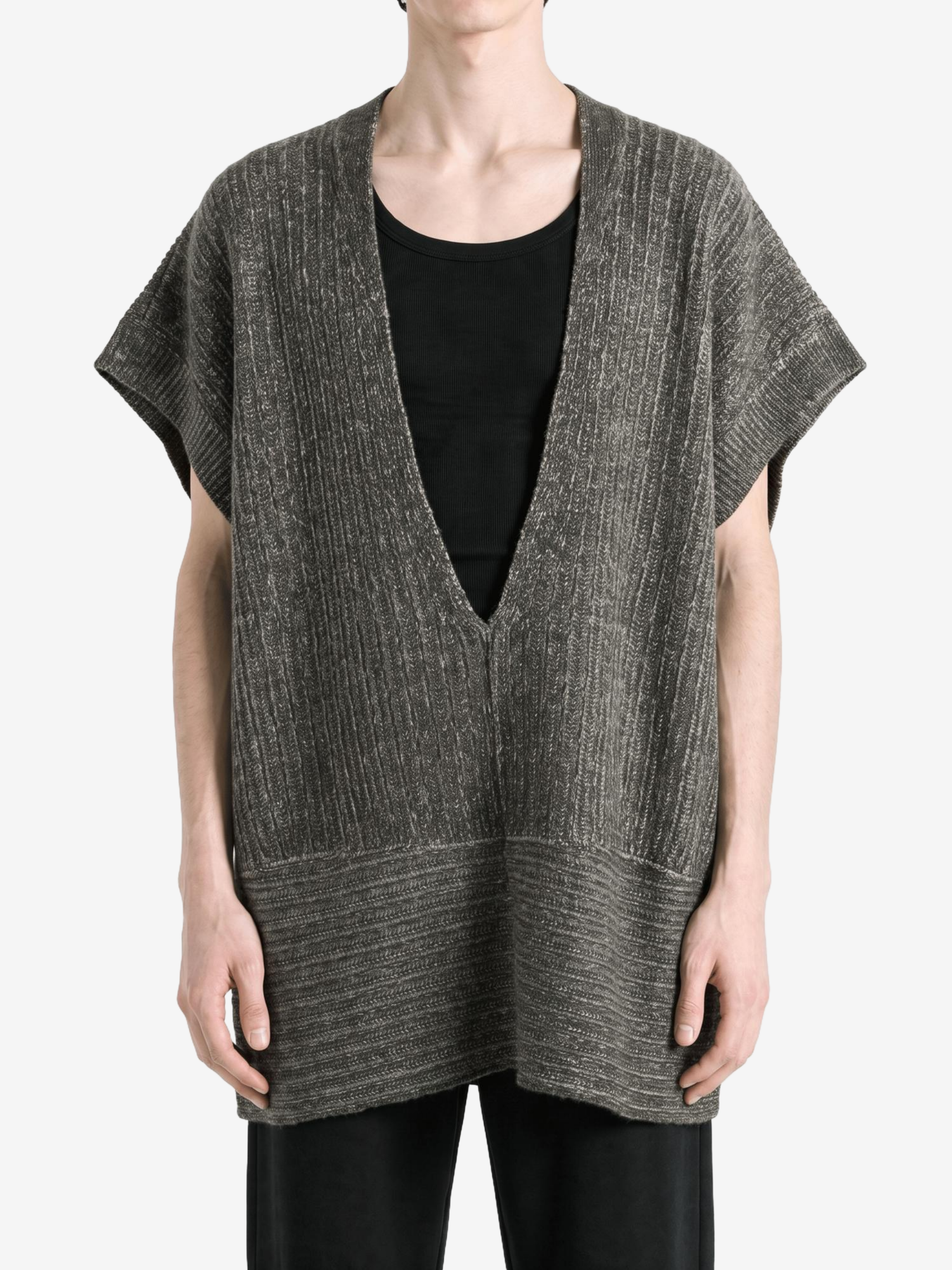 Grey knitwear worn by a person, showing the knitwear fit