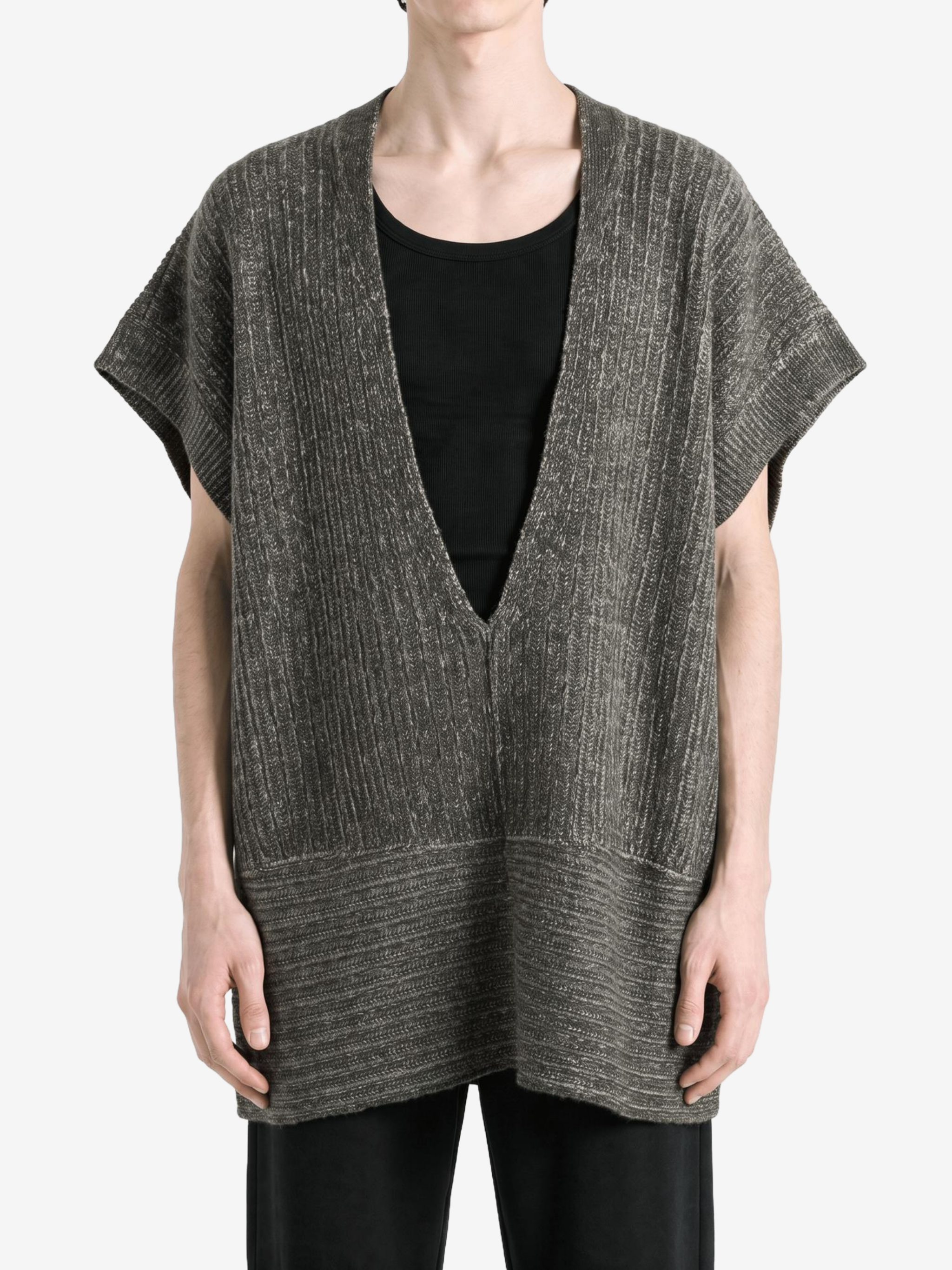 Grey knitwear worn by a person, showing the knitwear fit