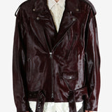 Brown jacket worn by a person, showing the jacket fit