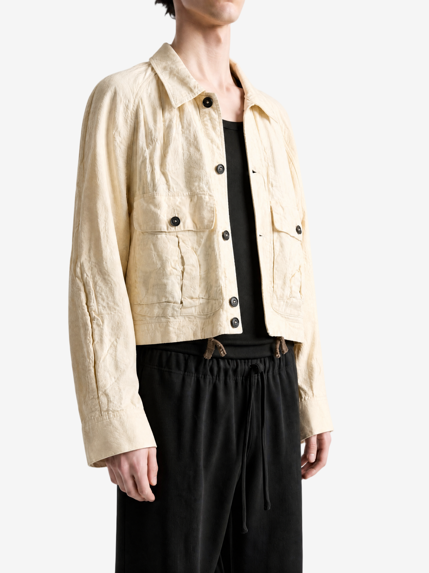 Tan jacket worn by a person, showing the tan jacket's fit