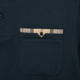 Close up of Navy shirt, showing texture of the 100% cotton fabric