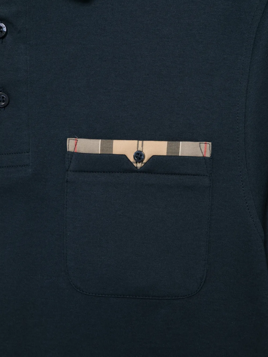 Close up of Navy shirt, showing texture of the 100% cotton fabric