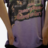Purple t-shirt worn by a person, showing the t-shirt fit