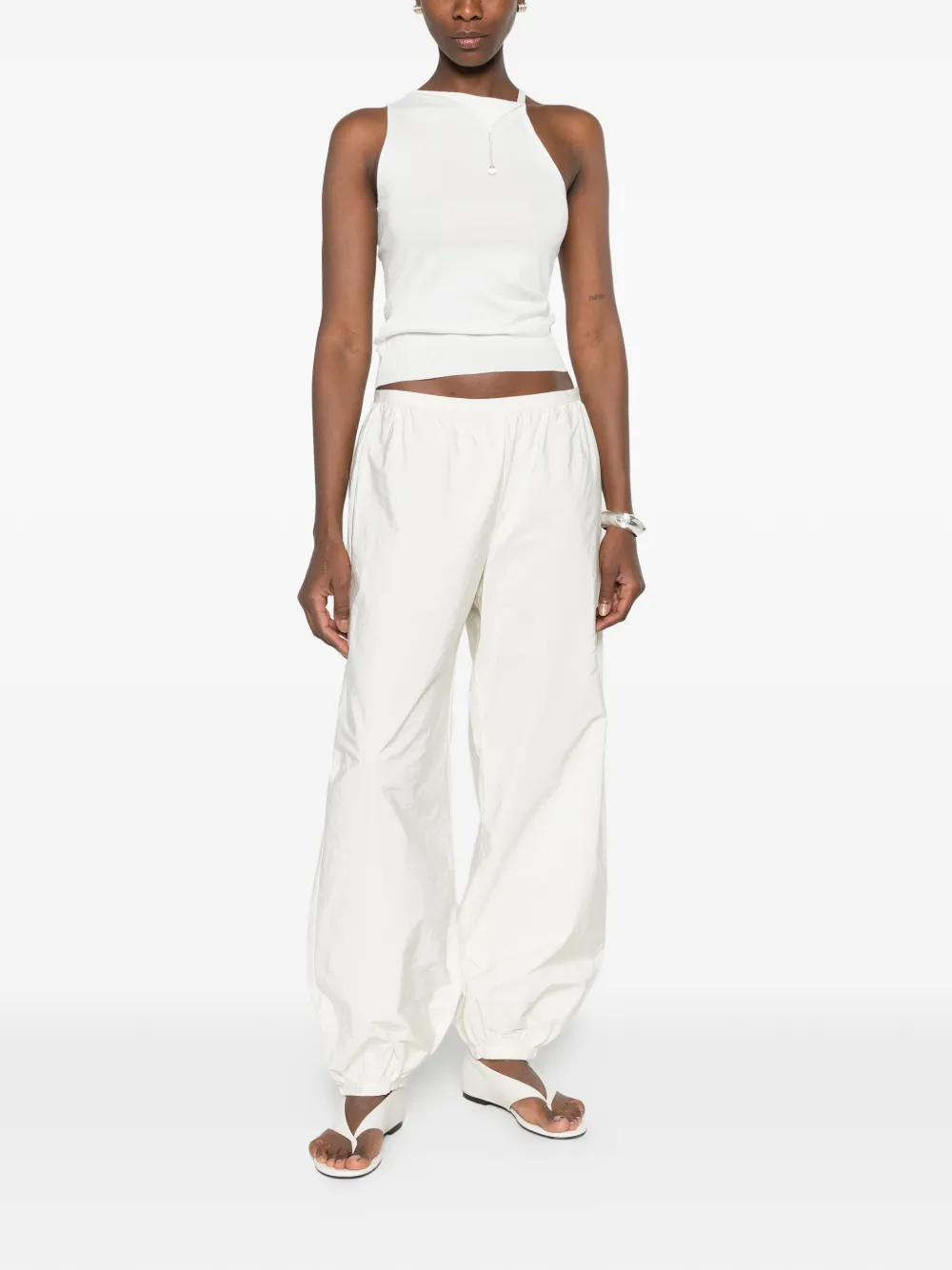 White top, full body view