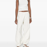 White top, full body view