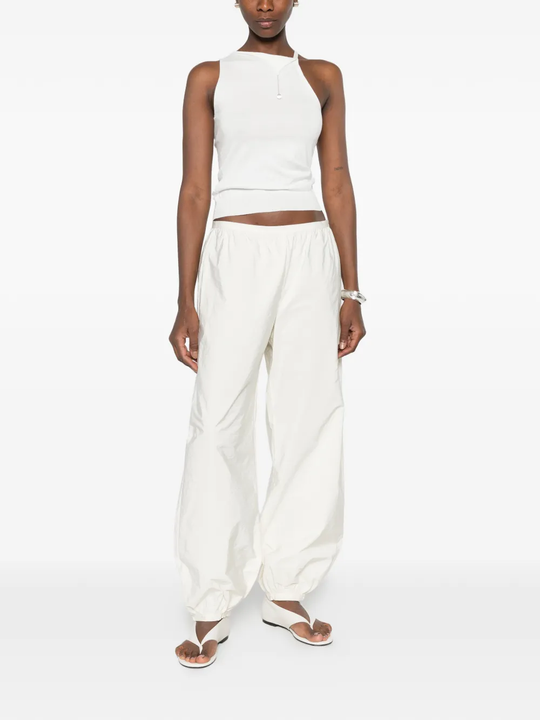 White top, full body view