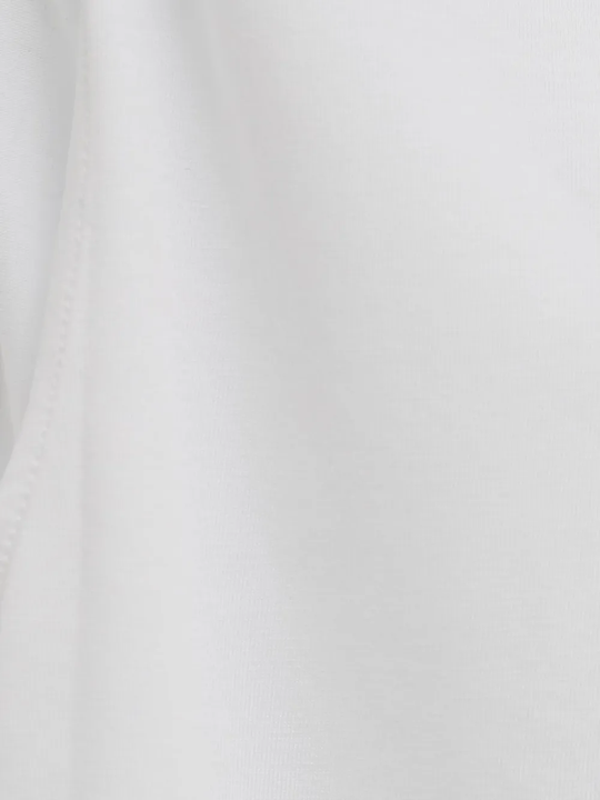 Close up of White top, showing texture of the 96% cotton/ 4% elastane fabric