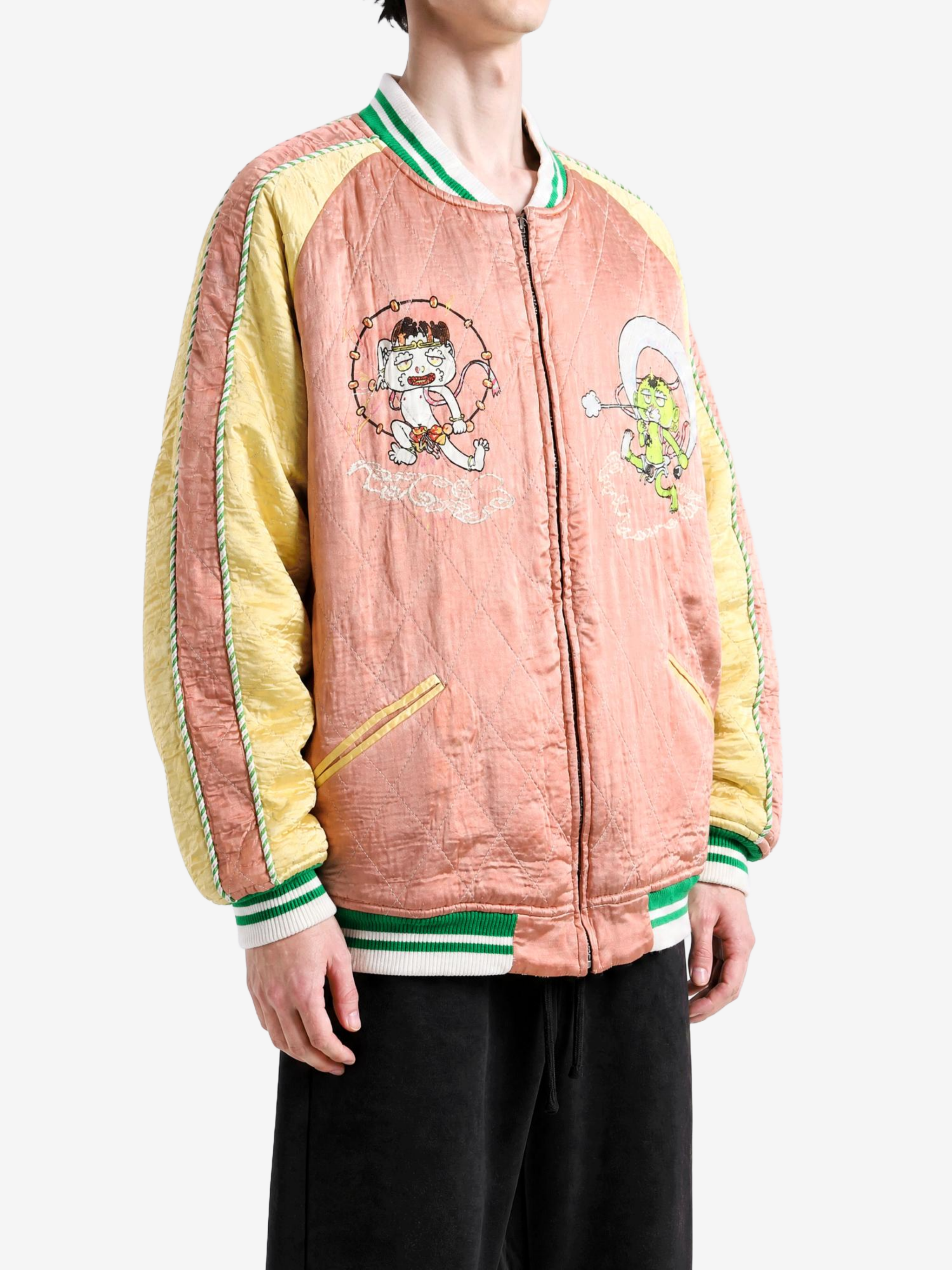 Pink jacket worn by a person, showing the jacket fit
