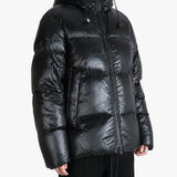 Black jacket worn by a person, showing the jacket fit