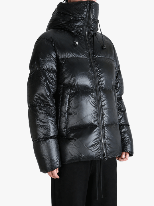 Black jacket worn by a person, showing the jacket fit