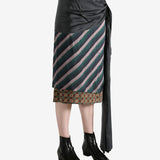 Navy skirt worn by a person, showing the skirt's fit