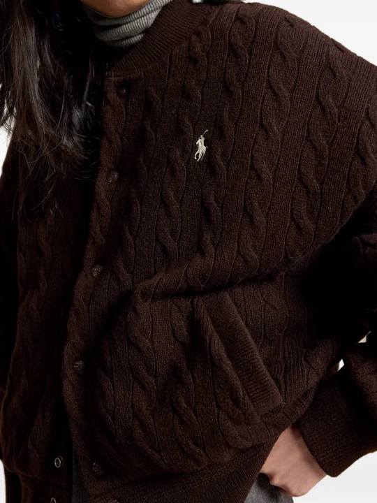 Brown jacket worn by a person, showing the jacket fit