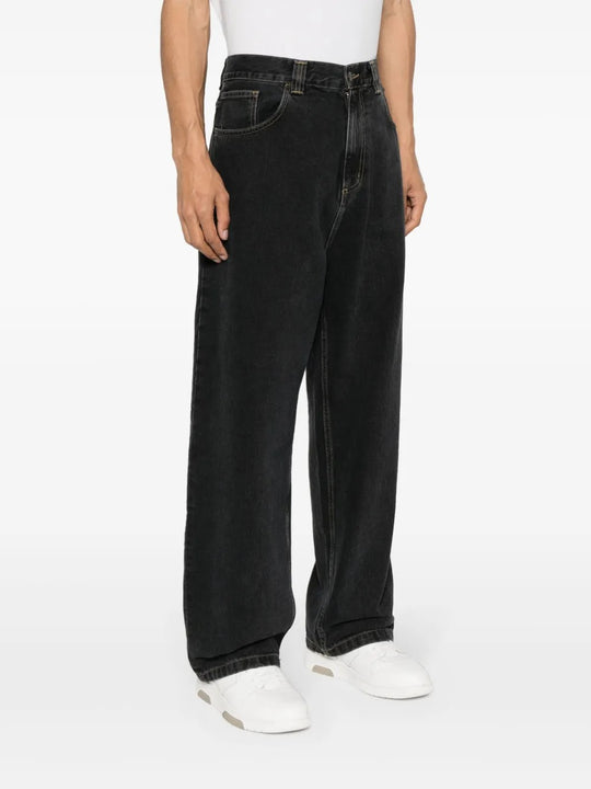 Blue pants worn by a person, showing the pants' fit