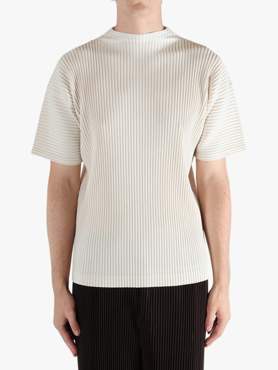 White t-shirt worn by a person, showing the t-shirt's fit