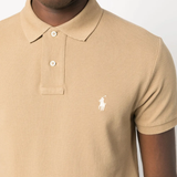 close up of yellow t-shirts, showing texture of the cotton  fabric