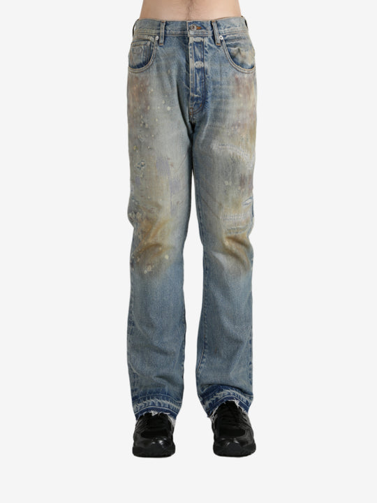 Blue jeans worn by a person, showing the jeans's fit