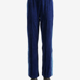 Blue pants worn by a person, showing the pants' fit