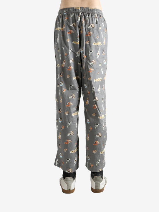 Grey pajama worn by a person, showing the pajama's fit