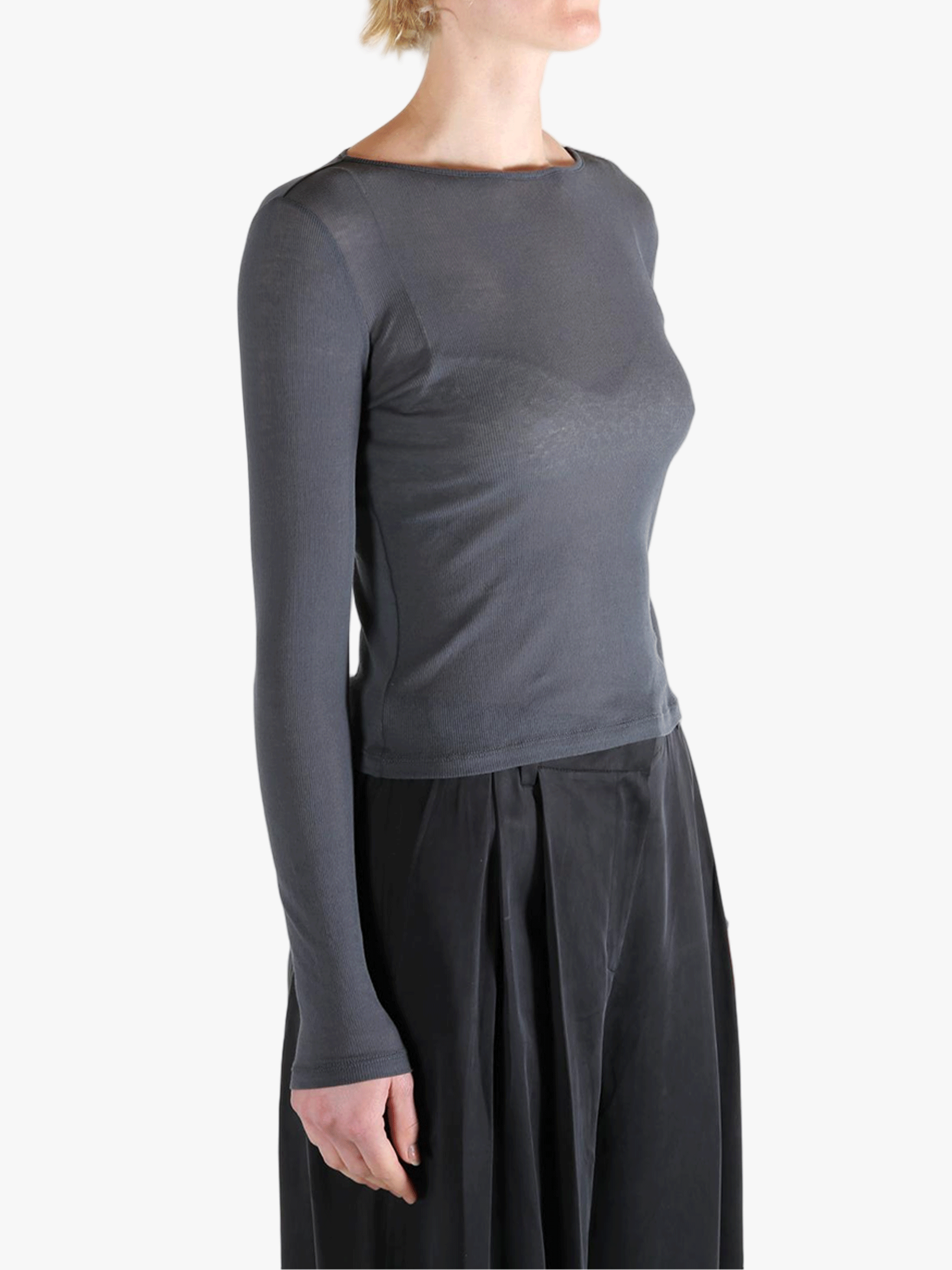 Grey shirt worn by a person, showing the shirt's fit