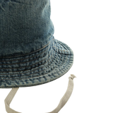 Close up of blue hat, showing texture of the Cotton fabric
