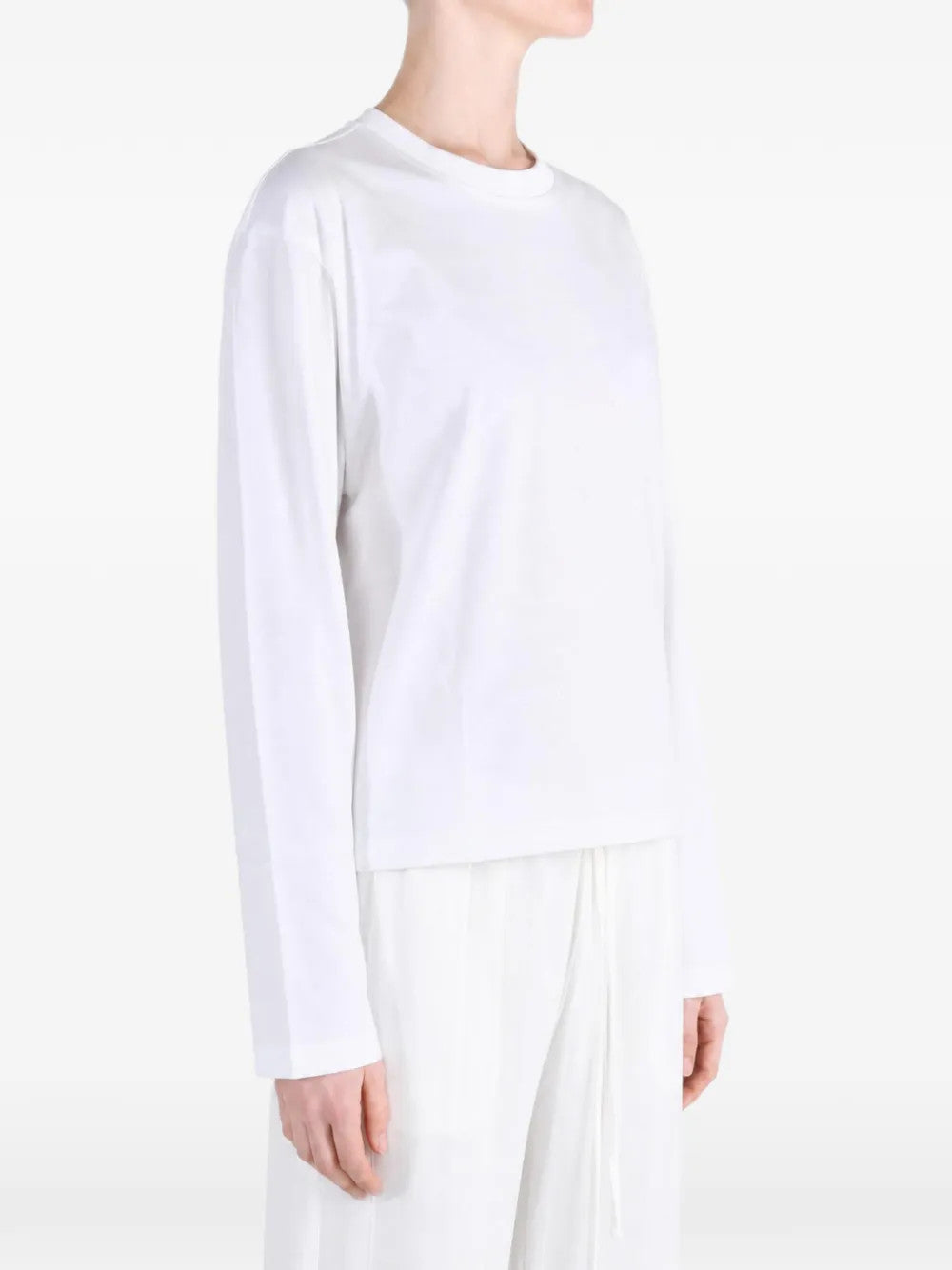 White top, full body view