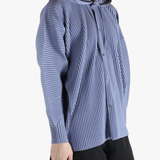 Blue jacket worn by a person, showing the jacket's fit